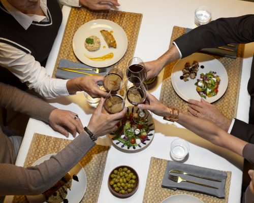top-view-friends-having-lunch-luxury-restaurant